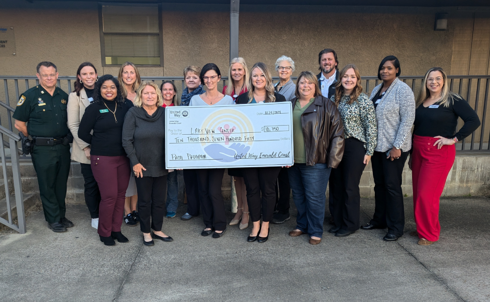 group photo with a check